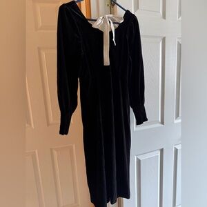 Elegant Black Dress with White Bow